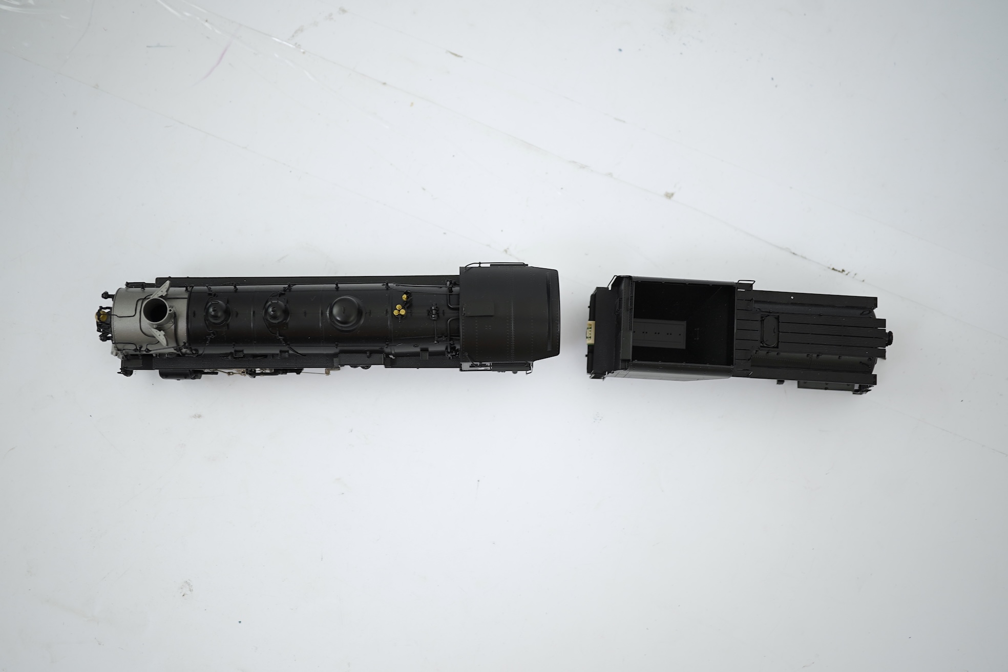 A boxed HO gauge Overland Models Inc. model of Union Pacific MK-7, 2262, 2-8-2 locomotive with bogie tender, powered for two rail operation.